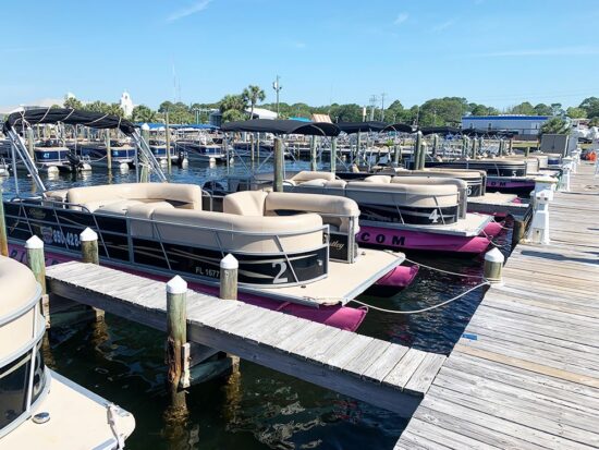 pontoon boats at the docks in fort walton beach
