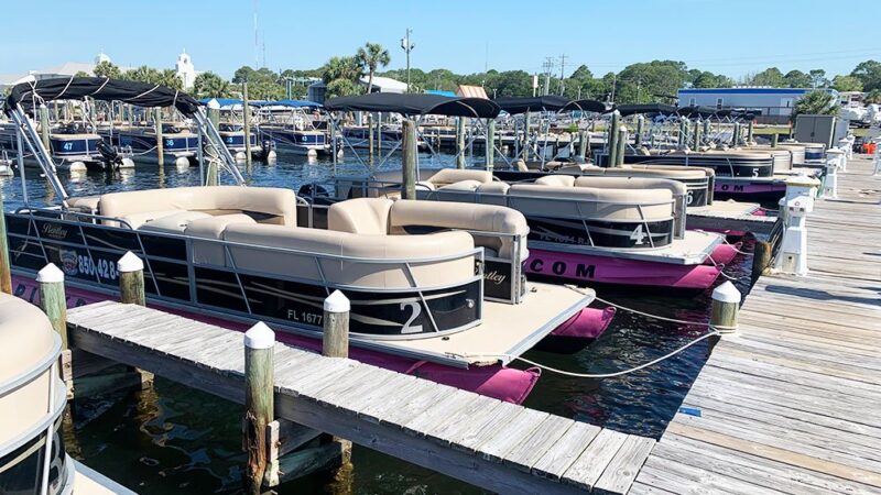 pontoon boats at the docks in fort walton beach